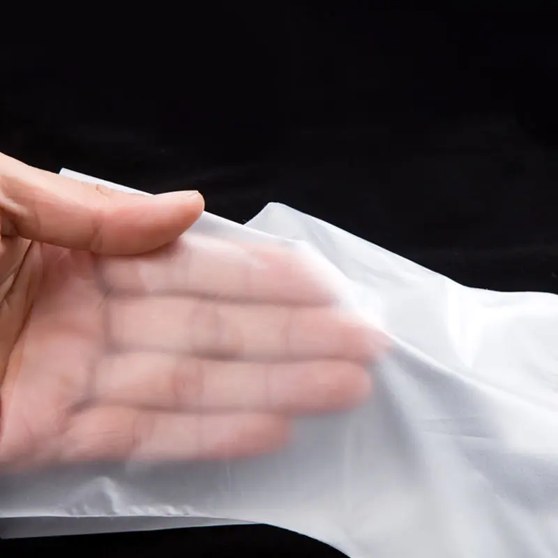 ‌‌‌Guantes TPE suaves y ecológicos de color blanquecino (textura mate)